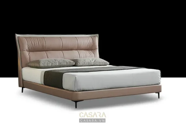 Giường ngủ hiện đại, sang trọng với tông màu hồng nhạt ấm áp.