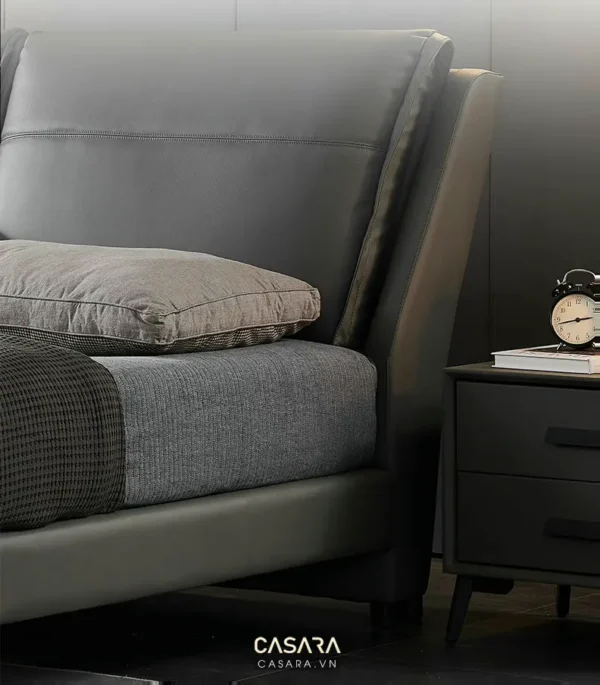 Giường ngủ hiện đại, sang trọng với thiết kế đầu giường độc đáo.