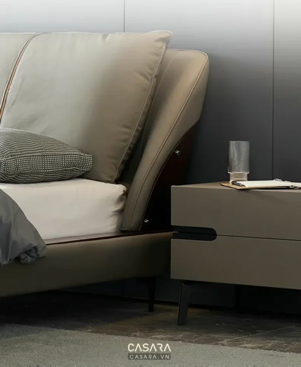 Giường ngủ hiện đại với tông màu trung tính ấm cúng, sang trọng.