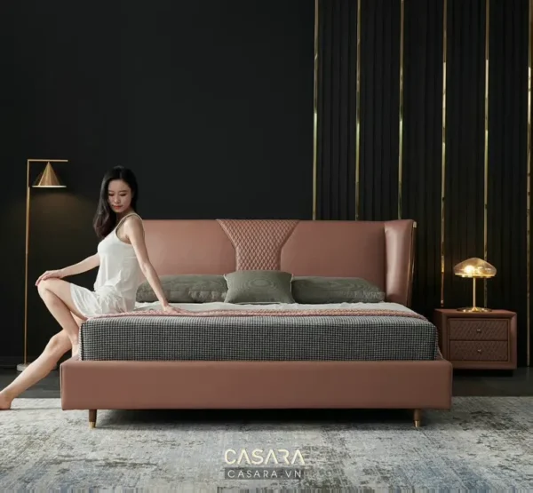 Phòng ngủ hiện đại, sang trọng với giường màu hồng pastel ấm áp.