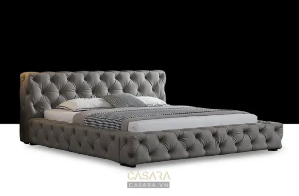 Giường ngủ bọc da sang trọng, kiểu dáng hiện đại, màu xám tinh tế.