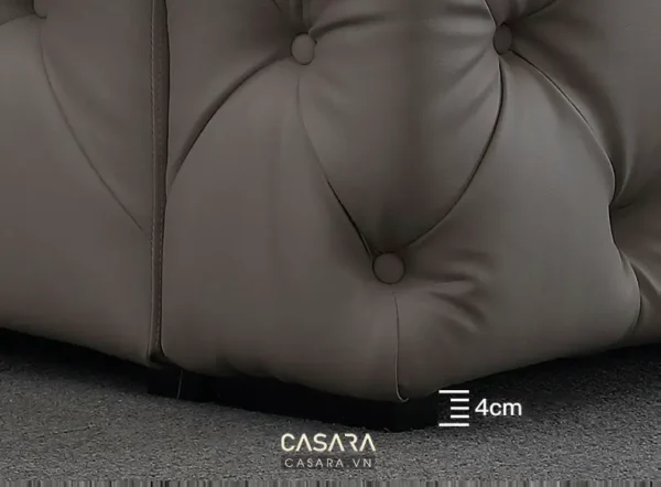 Góc khuất của ghế sofa nệm bọc vải, chi tiết đường may tinh tế.