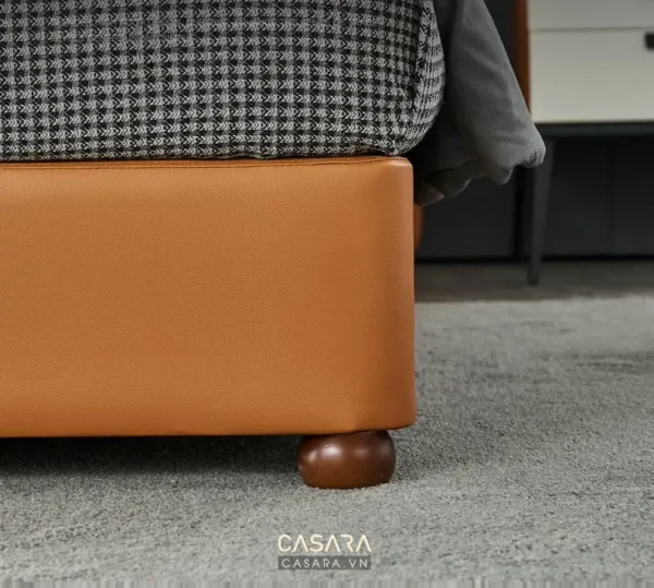 Góc giường da cam ấm cúng, thiết kế hiện đại tinh tế.