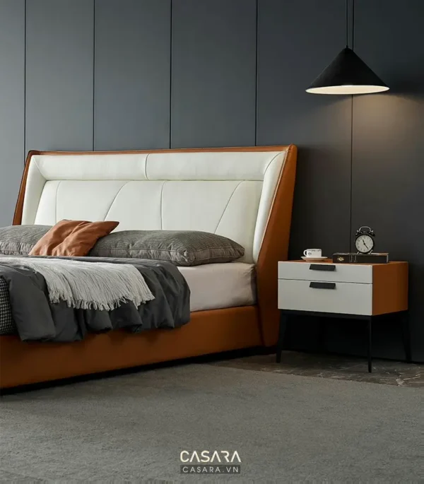 Phòng ngủ hiện đại, sang trọng với giường và tủ đầu giường tinh tế.