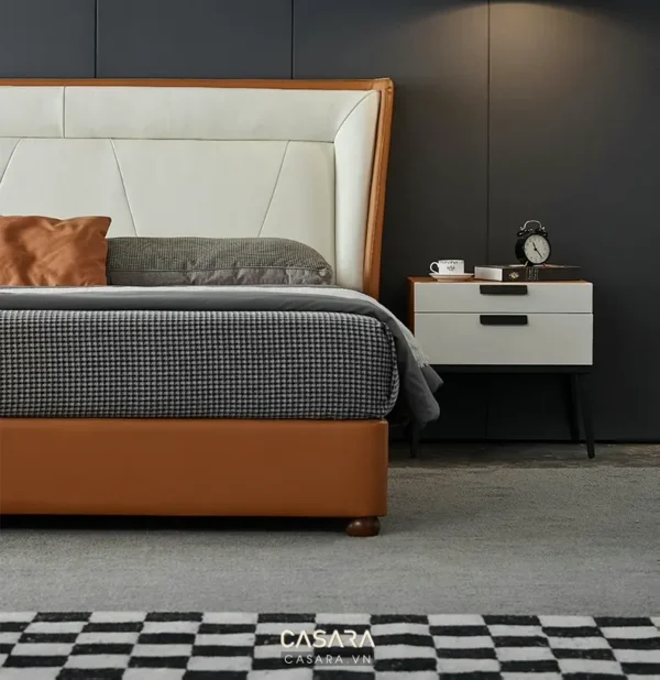 Phòng ngủ hiện đại với giường và tủ đầu giường sang trọng.