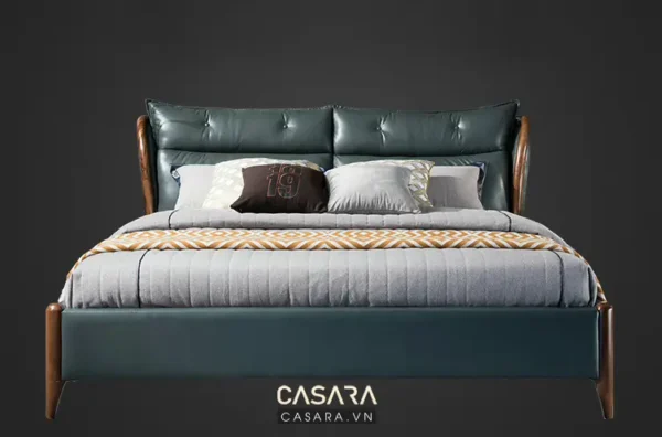 Giường ngủ hiện đại, màu xanh đậm, thiết kế sang trọng và êm ái.