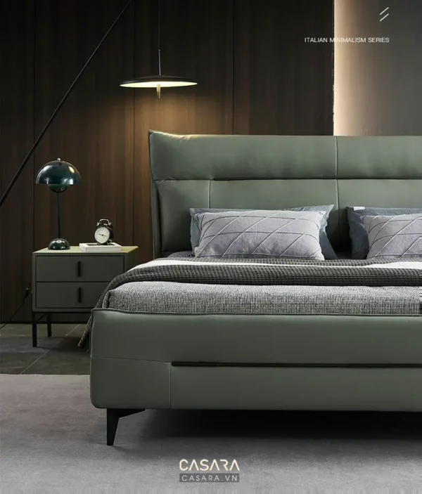 Phòng ngủ tối giản, sang trọng với giường và đèn bàn hiện đại.