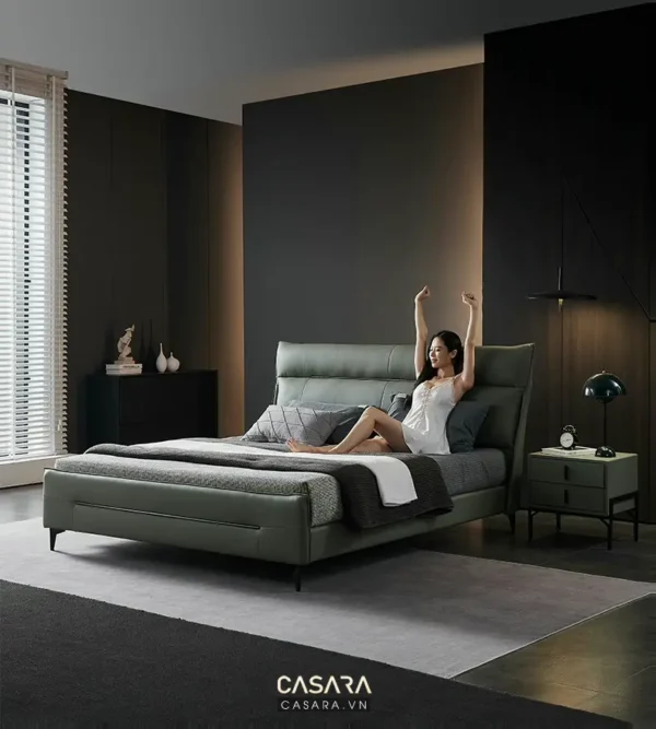 Phòng ngủ hiện đại, sang trọng với giường màu xanh rêu tinh tế.