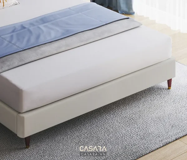 Giường đơn màu trắng tinh tế, hiện đại và thoải mái.