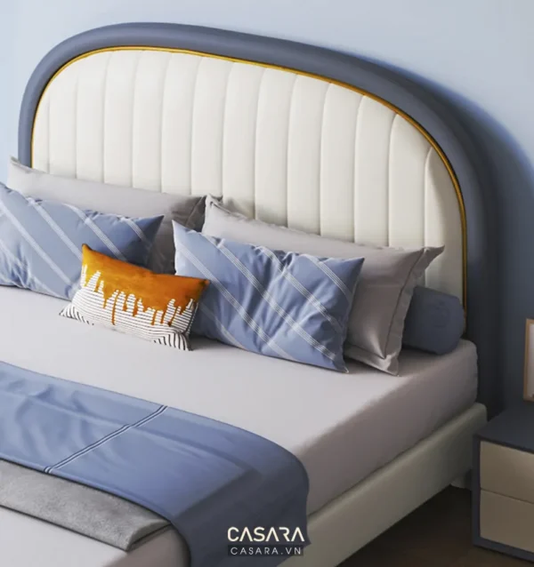 Giường ngủ phong cách hiện đại với đầu giường cong mềm mại.