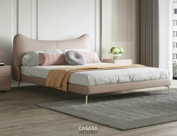 Phòng ngủ hiện đại, sang trọng với giường màu hồng pastel làm điểm nhấn.