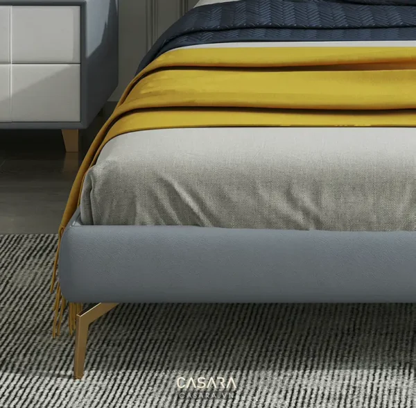 Góc giường ngủ hiện đại với sự kết hợp màu sắc tinh tế.