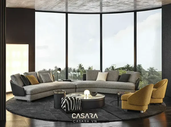 Phòng khách hiện đại với sofa góc và cửa sổ lớn.