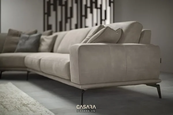 Ghế sofa góc hiện đại, màu be tinh tế, phòng khách sang trọng.