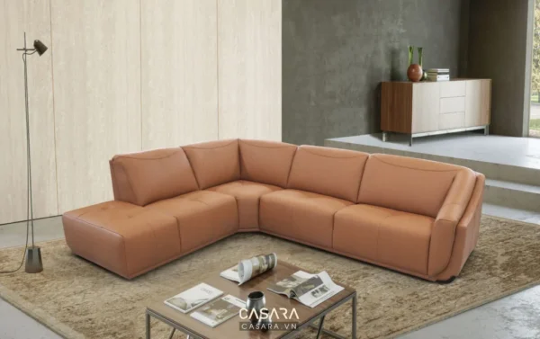 Bộ sofa góc da màu cam nâu hiện đại, sang trọng trong không gian phòng khách.