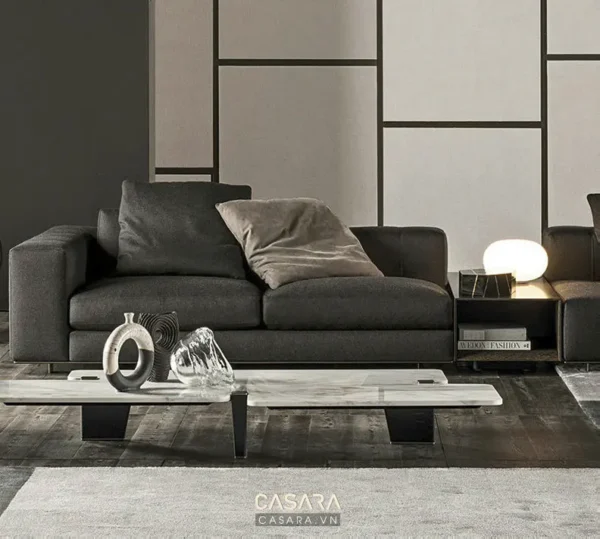 Phòng khách hiện đại với sofa xám và nội thất tối giản.