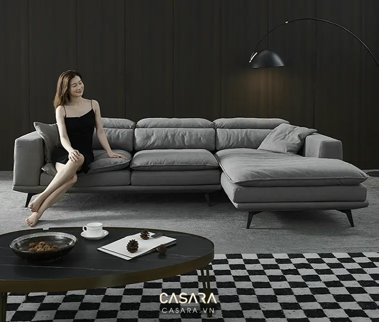 bộ sofa bàn trà phòng khách với sofa góc xám và bàn trà tròn mặt đá