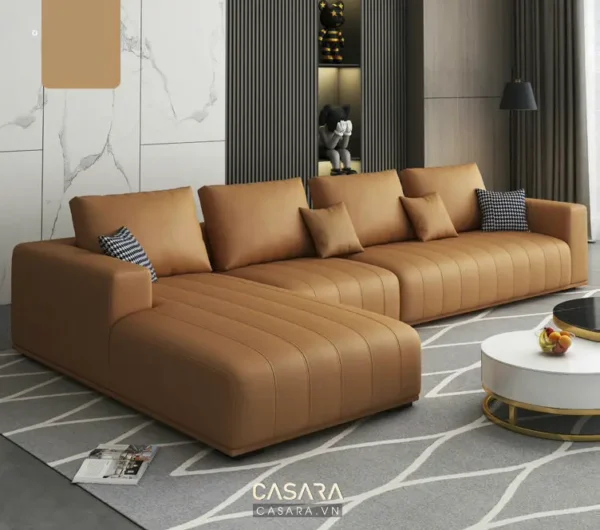 Bộ sofa góc da màu cam hiện đại, sang trọng trong không gian phòng khách.