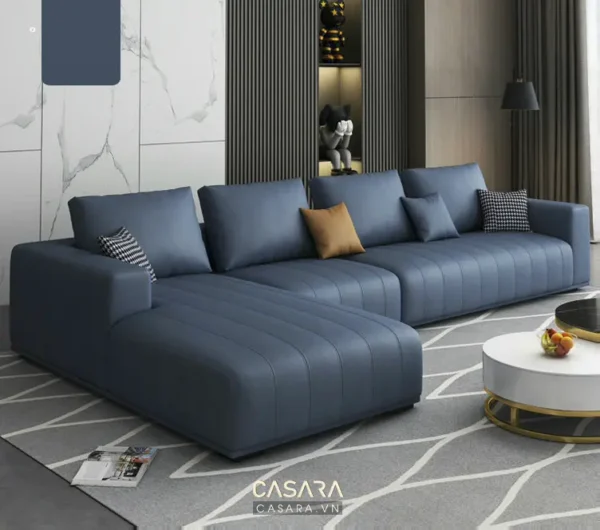 Bộ sofa góc hiện đại, sang trọng với tông xanh navy làm chủ đạo.