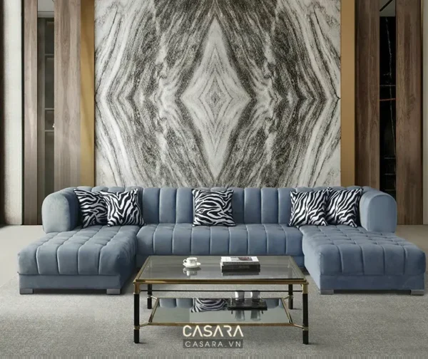 Bộ sofa góc màu xanh dương hiện đại, sang trọng trong không gian phòng khách.