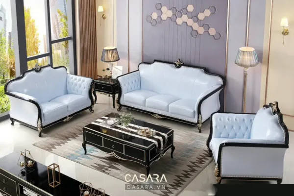 Bàn ghế sofa màu xanh nhạt trong phòng khách sang trọng.
