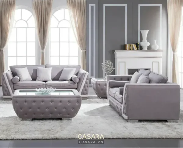 Phòng khách sang trọng với bộ sofa tím.