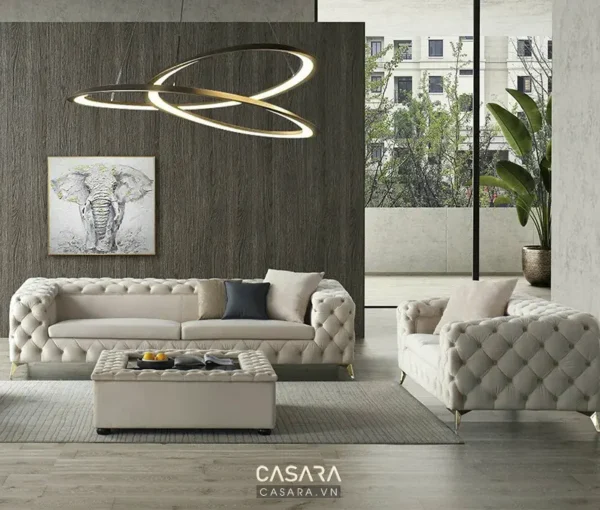 Phòng khách sang trọng với bộ sofa trắng tinh tế, hiện đại.