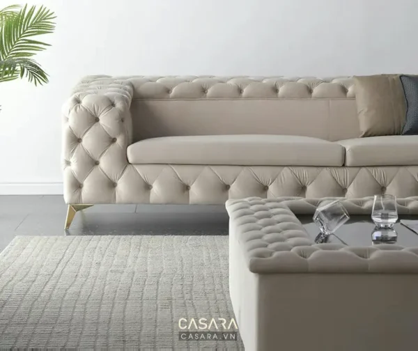 Bộ sofa góc nệm bọc nhung tinh tế, sang trọng cho phòng khách hiện đại.