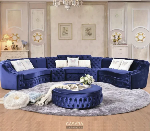 Phòng khách sang trọng với sofa xanh dương và nội thất tinh tế