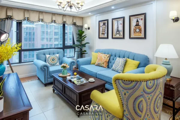 Phòng khách hiện đại, ấm cúng với nội thất màu xanh, vàng tươi sáng.