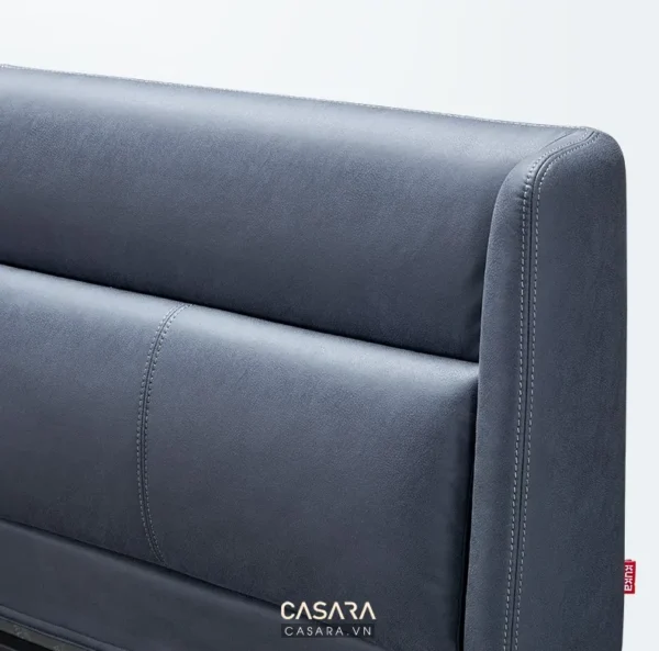 Đầu giường bọc da màu xám thanh lịch, hiện đại.