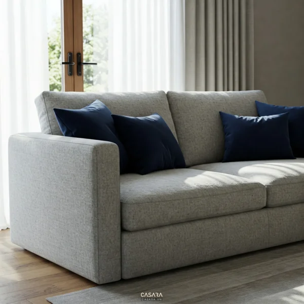 Sofa vải nỉ ghi sáng cạnh cửa kính cho phòng khách nhỏ