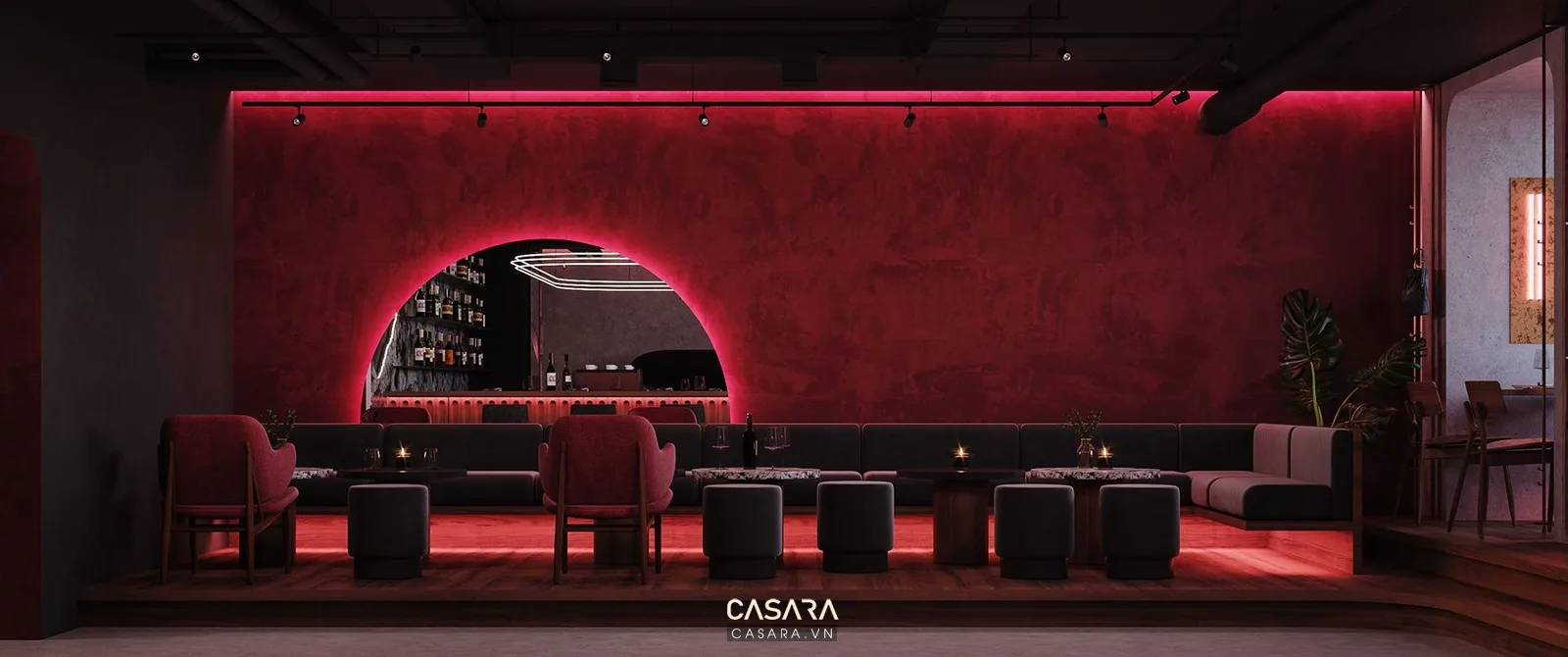 Thiết kế quán bar lounge với ánh sáng đỏ đen, sofa và vòm trang trí tạo điểm nhấn cho khu khách ngồi.