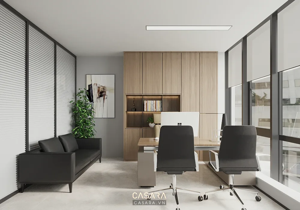 Phòng giám đốc có bàn làm việc, ghế khách, sofa và tủ kệ gọn