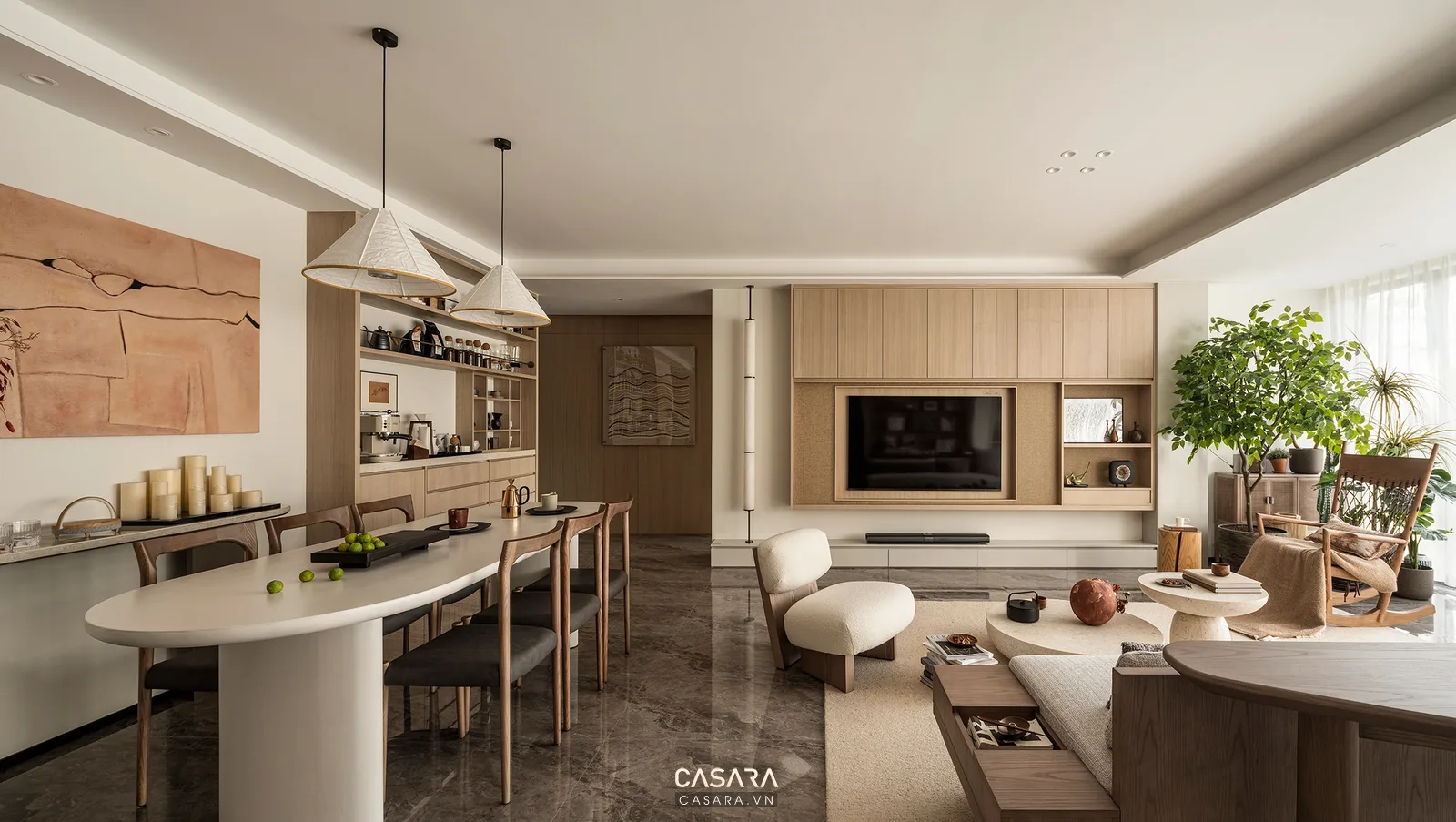 Ảnh phòng khách liên thông bếp với đảo bếp và tủ gỗ do Casara tuyển chọn cho thư viện thiết kế nội thất.