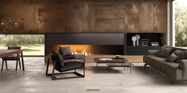 Phòng khách căn hộ mở với sofa da tối màu, trần bê tông và tầm nhìn thoáng