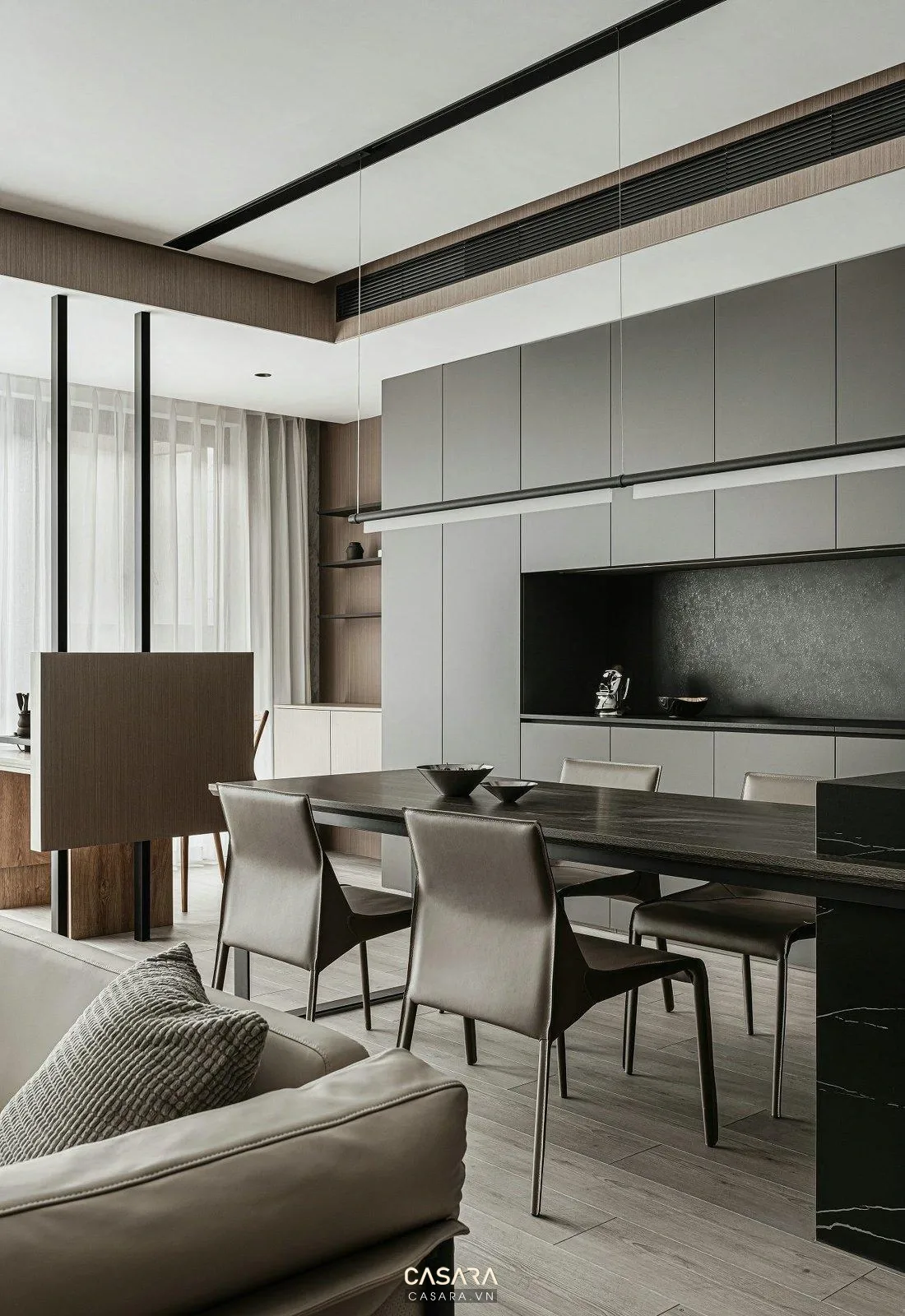 Ảnh phòng khách phong cách hiện đại với sofa, bàn trà, vách tivi, tủ kệ và ánh sáng tự nhiên trong thư viện Casara.
