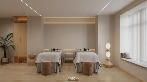 Phòng salon thẩm mỹ có hai giường dịch vụ, ánh sáng dịu và rèm cửa lớn