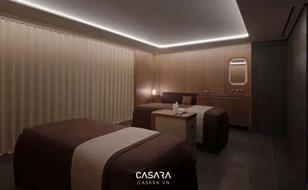 Nội thất spa tông nâu trầm với giường massage và rèm mềm