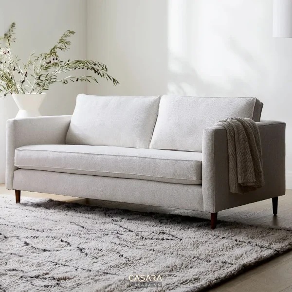 Ảnh thiết kế ghế sofa phong cách Bắc Âu với dáng sofa, màu sắc, chất liệu và bối cảnh phòng khách trong thư viện Casara.