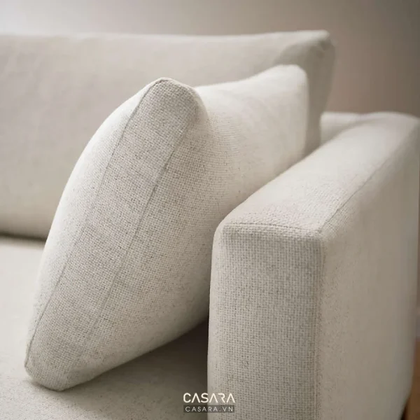 Ảnh thiết kế ghế sofa phong cách kính cường lực vàng kem với dáng sofa, màu sắc, chất liệu và bối cảnh phòng khách trong thư viện Casara.