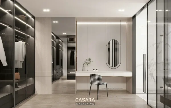 Ảnh tủ áo phòng thay đồ phong cách đá nhân tạo trắng sáng với khoang treo, kệ mở, cánh kính và lối đi dài trong thư viện Casara.