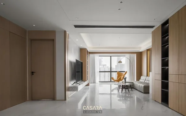 Không gian khách bếp mở với tủ âm tường và lối đi rộng trong chung cư nhỏ Casara.