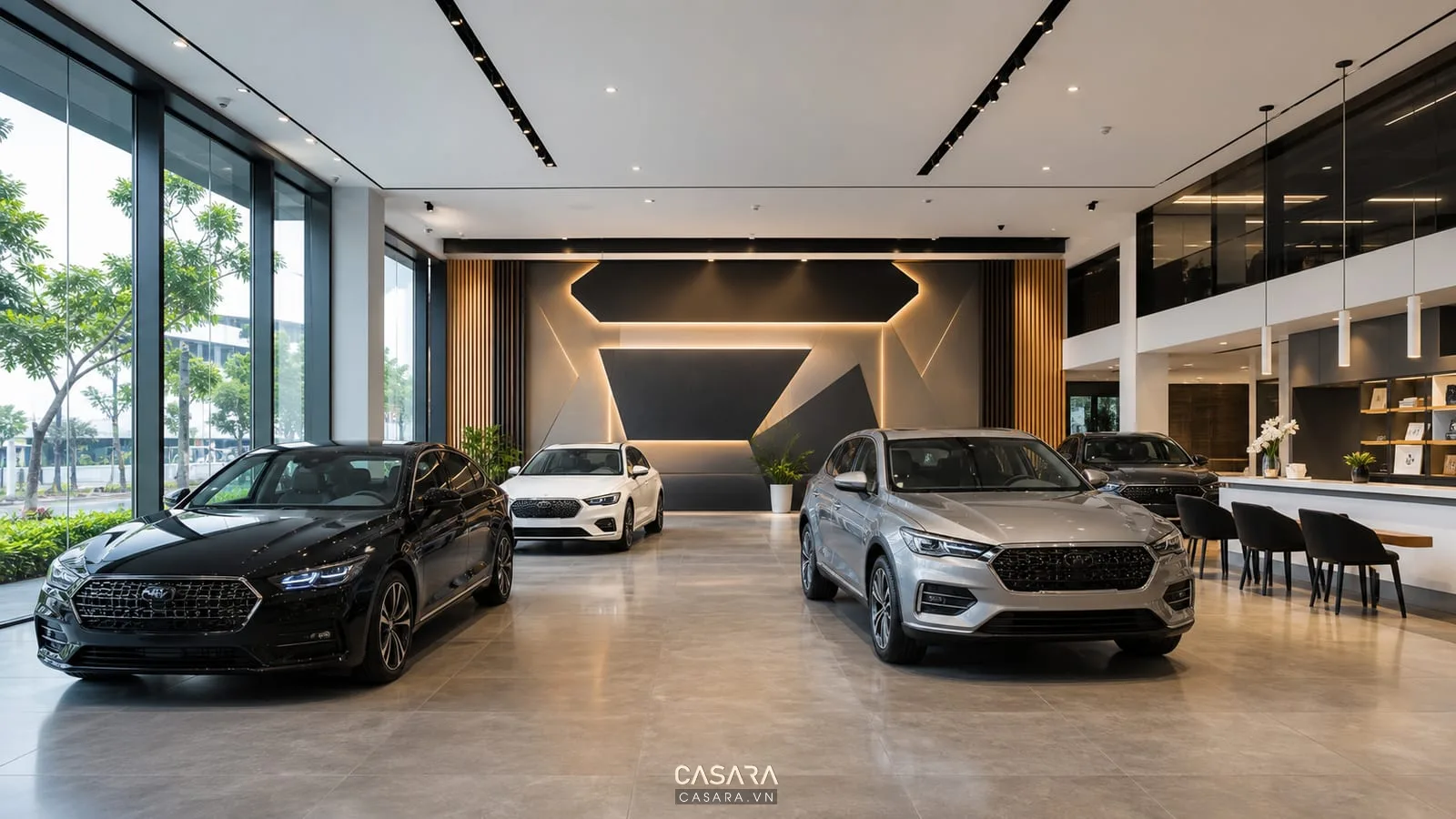 Showroom ô tô với xe trưng bày, đèn trần và vách nhận diện thương hiệu