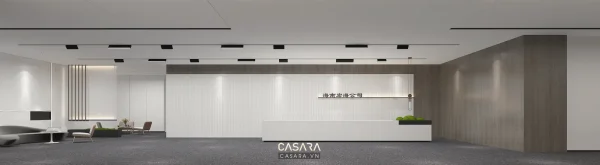 Ảnh khu tiếp khách cạnh lễ tân với bàn dài và ghế vàng do Casara tuyển chọn cho thư viện thiết kế nội thất.