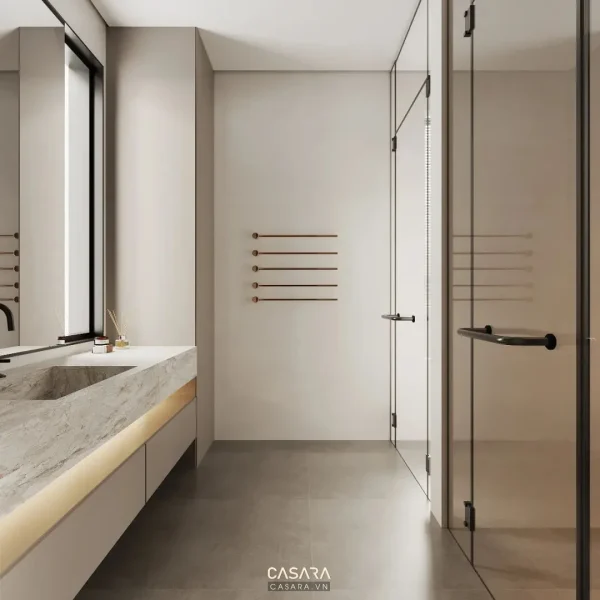 Ảnh phòng tắm kính có bồn rửa đôi và gương tròn do Casara tuyển chọn cho thư viện thiết kế nội thất.