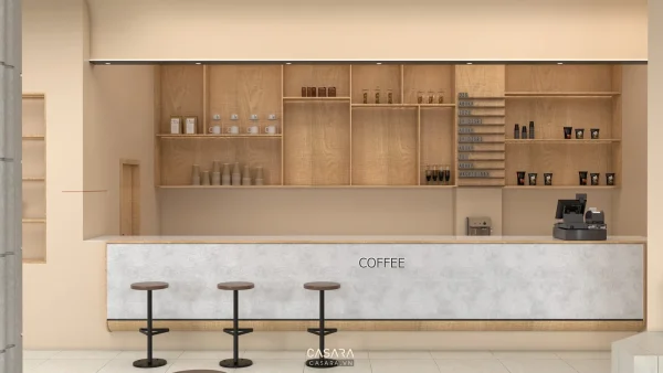 Quầy coffee với hệ kệ gỗ sáng và ghế bar trong không gian showroom