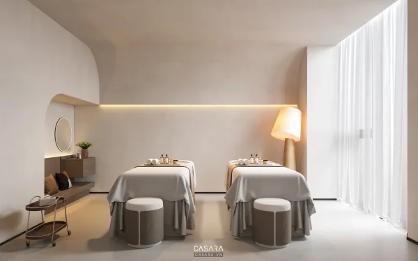 Ảnh phòng spa trắng xanh có giường massage và vách trang trí do Casara tuyển chọn cho thư viện thiết kế nội thất.