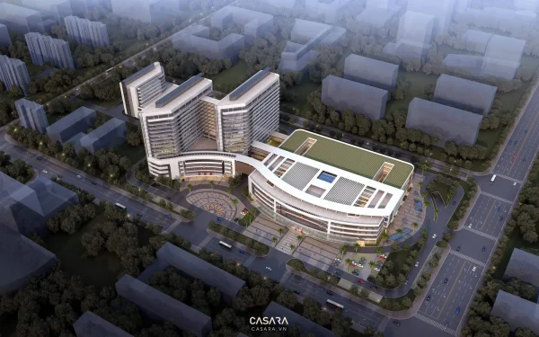 Ảnh tổng thể bệnh viện hiện đại với khối cong và cây xanh do Casara tuyển chọn cho thư viện thiết kế nội thất.