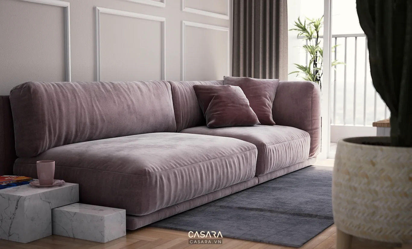 Sofa trắng chữ L với bàn trà đen trong phòng khách hiện đại